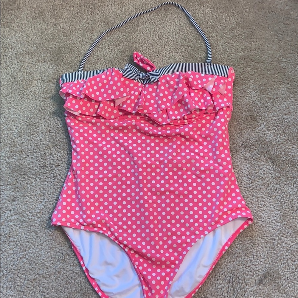 One piece pink polka dotted swimsuit